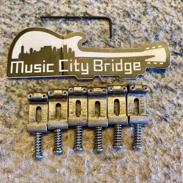 MUSIC CITY BRIDGE GROOVE MASTER SADDLES FOR STRAT, Aged